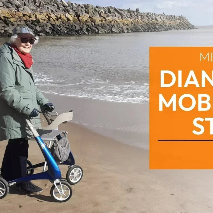 Lady on the beach with her byACRE rollator
