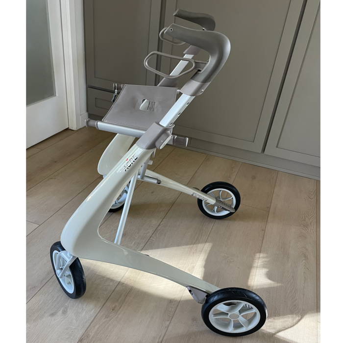 Oyster White Ultralight rollator  side view indoors.  Practical, lightweight and so easy to use.