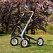 The Overland on the grass with pink blossom in the background waiting to be used off road