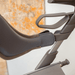 Side view of the padded backrest fitted to the byACRE Carbon Ultralight rollator, showing how it attaches below the handles