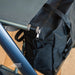Close-up of the zip and pull cord on the byACRE Daypack bag, fitted under the seat of a byACRE Carbon Overland rollator