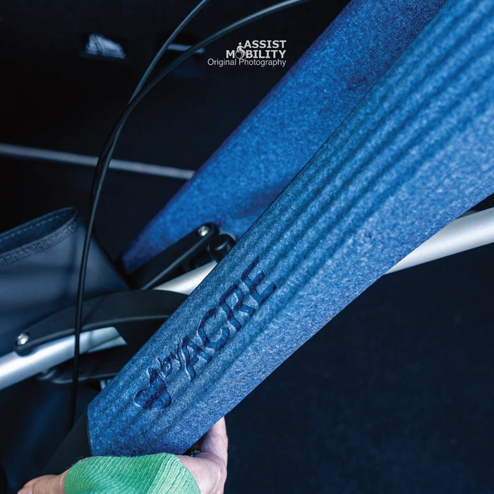 Detail of the embossed byACRE logo on the textured EPP frame of the Baltic Blue byACRE Nordic Pioneer rollator