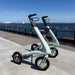 The Pioneer standing by the sea ready to work and assist in everyday walking.  Briliiant blue sky and sea in the background - perfect for the Pioneer to help with exploring