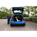 Gentleman next to small car with Rollator in the boot