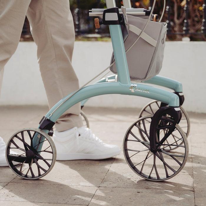 Close up of the colour and wheels of the Saljol Allround Rollator Superlight Ice Blue rollator 