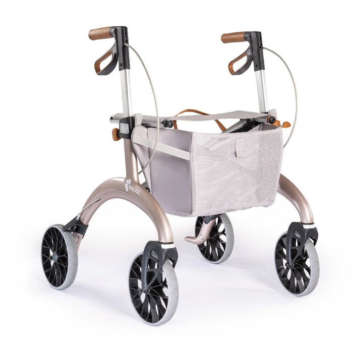 Saljol Carbon Superlight rollator in Rose Gold with a light grey mesh shopping bag and tan handles, on a white background