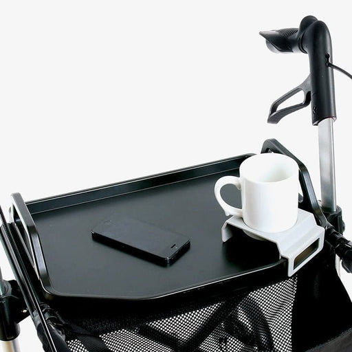 Sunrise Medical rollator tray showing a mobile phone resting neatly and a cup in the handy cup holder