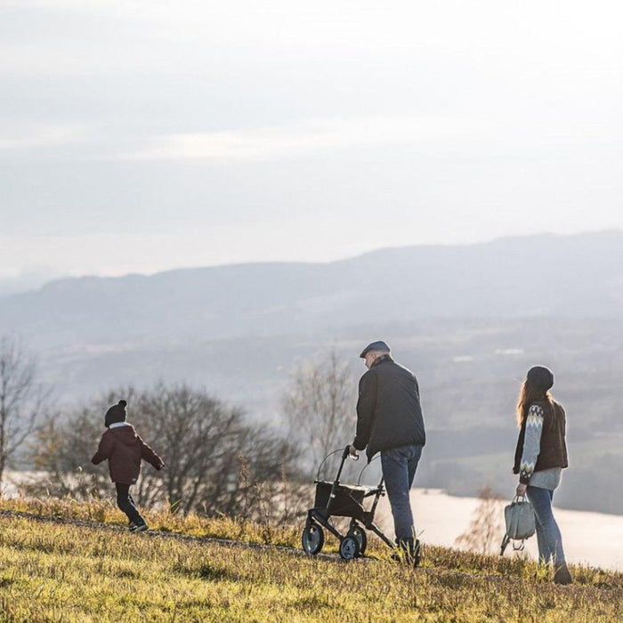 Topro family walking countryside