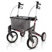 TOPRO ATR off-road rollator, wine red coloured. Viewed obliquely from the front