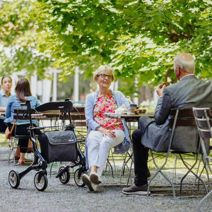 Couple out for a coffee break relaxing and chatting with the Topro Pegasus