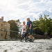 Couple out for a stroll along the river bank with the Topro Pegasus rollator