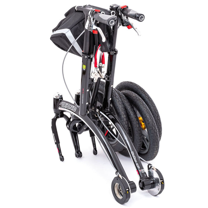 Trionic walker with pneaumatic tyres removed and frame folded at Assist Mobility 