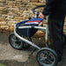 Detail of the Trionic Veloped Sport frame showing the Veloped and Trionic logos, chunky off-road wheels and striped bag