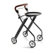Black Let's Dream indoor rollator with tray and brown faux leather handle