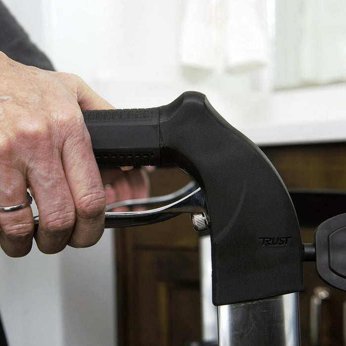 Close up of the brake handles of the Lets Fly rollator.