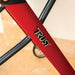 Close-up of a red frame of the Trust Care Lets Go Indoor rollator
