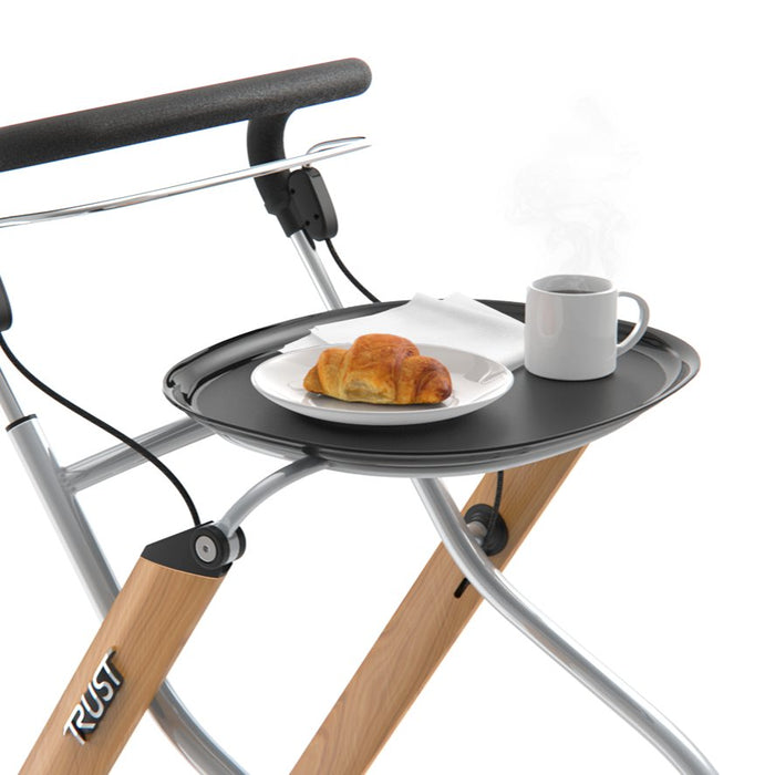 Trust Care Lets Go rollator with a cup of tea and croissant on tray showing curved edges to hold contents