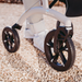 Close up of the tough wheels being used on gravel making the Saljol ALU rollator  a great all round rollator.  Touch and dependable for any use.