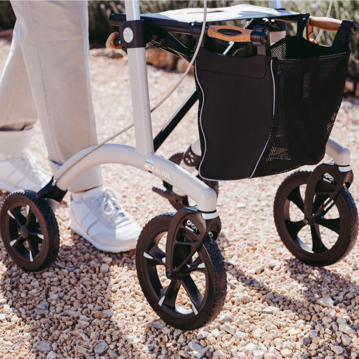 Close up of wheels and the handy bag of the Saljol ALU rollator .